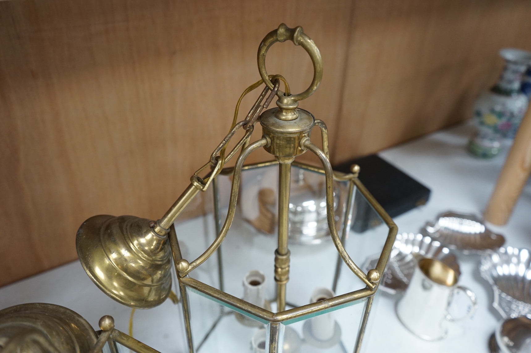 A pair of French octagonal glass and brass lanterns, 40cm